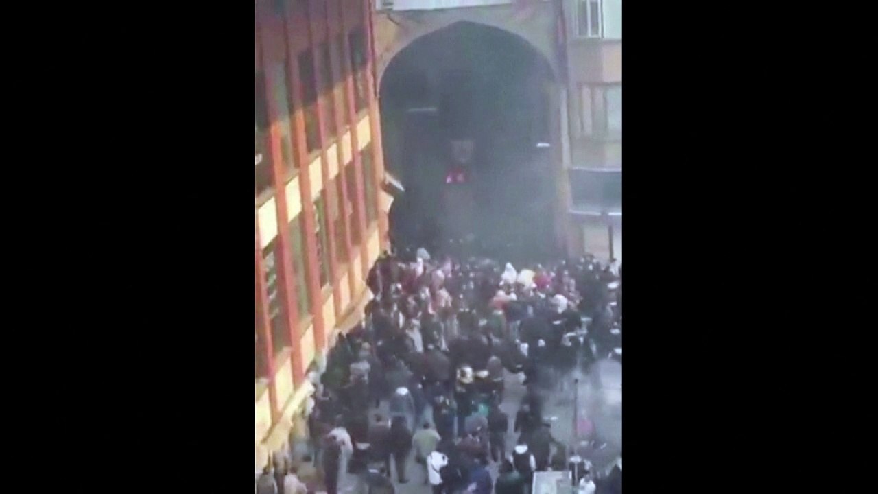 Clashes between Iranian security forces and protestors at the Tehran bazaar, with police firing tear gas to disperse demonstrators, posted on social media on January 6, 2026