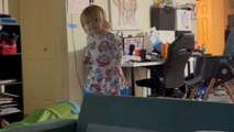 Little girl goes all out climbing a couch but ends up falling
