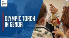 Olympic flame stops by children's hospital in Genoa