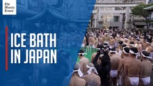 Japanese take plunge in Tokyo shrine's ice bath to pray for New Year