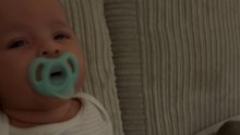 One-month-old baby boy bops all by himself to Michael Jackson's music