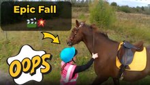 Girl nearly falls off horse but grabs reins just in time to save herself