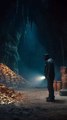 A lone explorer steps into a forgotten underground cave2