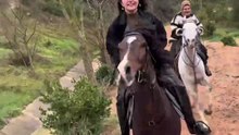 Riding a horse wildly in the forest