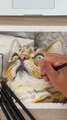 Dessin réaliste d'un chat avec les crayons de couleur