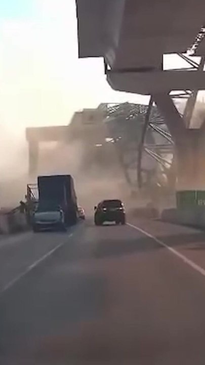 Two killed in Thailand after crane falls crushing cars one day after similar incident left dozens dead