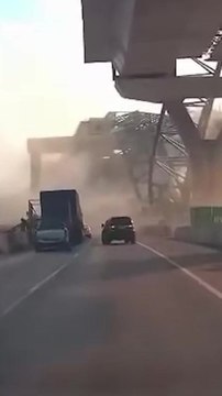 Two killed in Thailand after crane falls crushing cars one day after similar incident left dozens dead