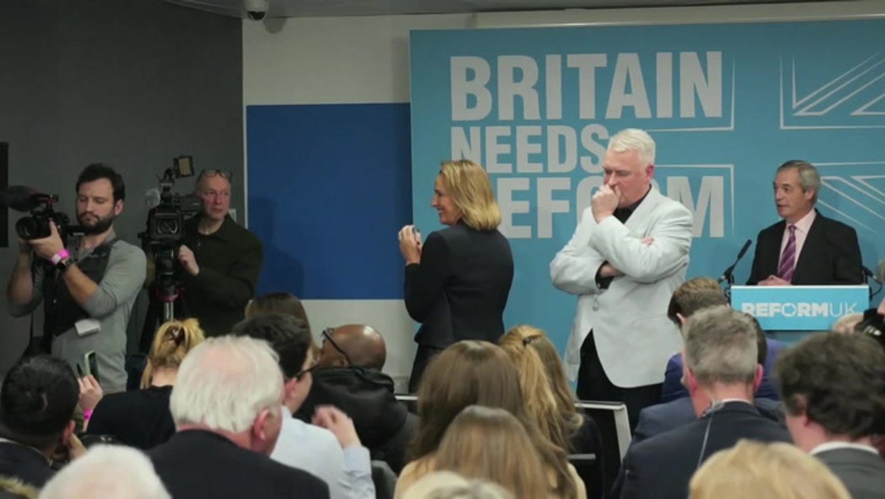 Awkward moment Nigel Farage left waiting as Robert Jenrick fails to appear at his own Reform unveiling