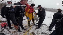Fisherman saved from freezing water in Michigan