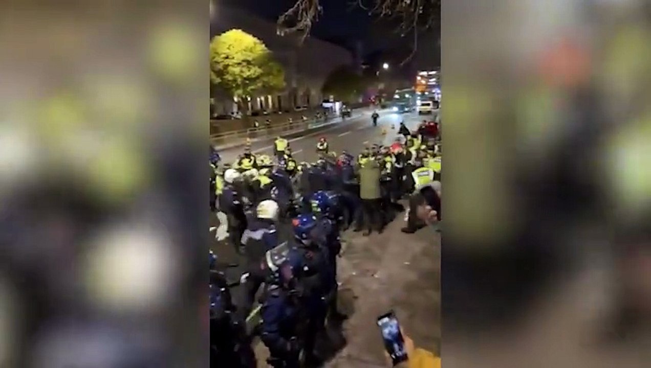 Police officers injured in 'violent disorder' outside Iranian embassy in London