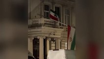 Iranian embassy flag torn down for second time as protesters clash with police