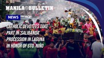 Catholic devotees take part in 'Salibanda' procession in Laguna in honor of Sto. Niño
