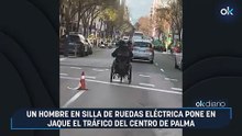 Un hombre en silla de ruedas eléctrica pone en jaque el tráfico del centro de Palma