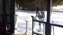 Epic fall: Man slips on ice right outside his home