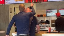 Man sticks plunger on boss’ head in a playful prank