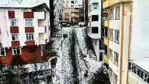 Arnavutköy'de kar yağışıyla kayak pistine dönen sokak dronla görüntülendi
