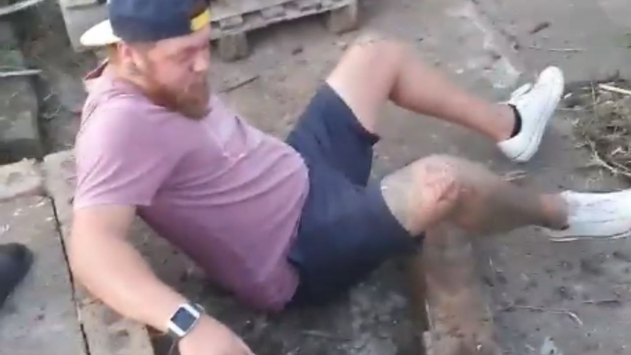 Man tries jumping on firewood but ends up crashing down instead