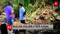 Damnificados buscan volver a sus casas tras lluvias en Hidalgo