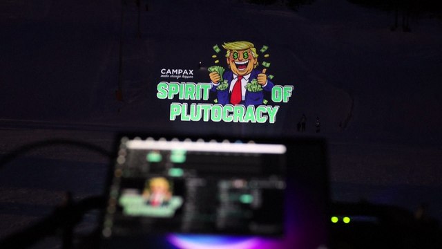 Activists use Trump ski slope projection to denounce Davos meeting