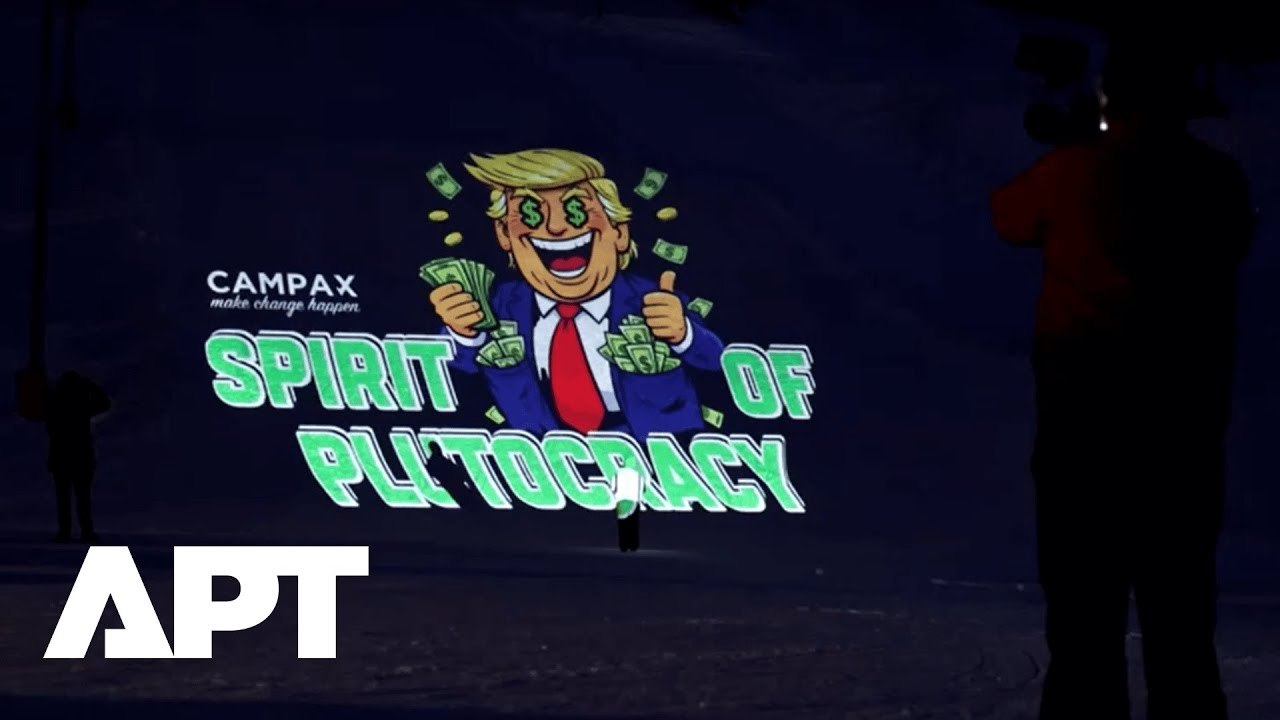 WATCH: Activists Project Giant Trump Image on Davos Ski Slope to Protest World Economic Forum | APT