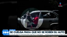 En Puebla una mujer se cuelga de automóvil para evitar que se lo roben