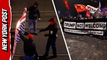 Protesters in Zurich torch US flags ahead of Trump's meeting in Davos