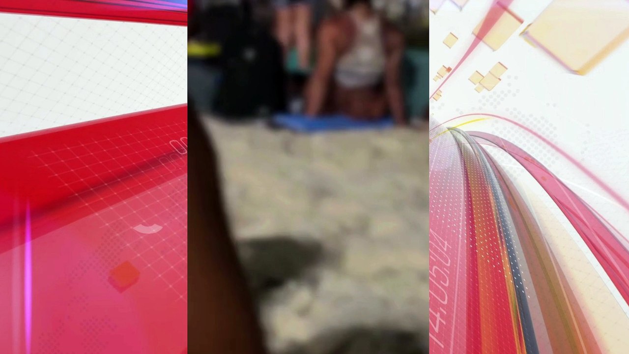 Casal é flagrado no sexo em praia lotado