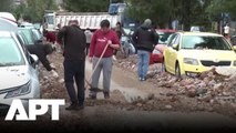 WATCH: Athens Floods Leave Streets Collapsed and Cars Buried | APT