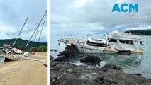 Damaged boats wash up on Airlie Beach after cyclone
