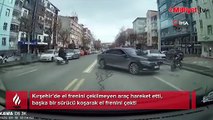 El frenini çekilmeyen araç hareket etti, başka bir sürücü koşarak el frenini çekti