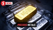 Silver hits US$100 per oz, gold closes in on US$5,000 milestone
