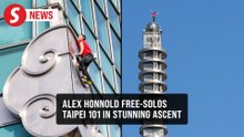 US climber scales Taiwan's tallest building Taipei 101 without ropes