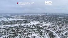 Кадры с дрона: заснеженные города США, работают снегоочистители