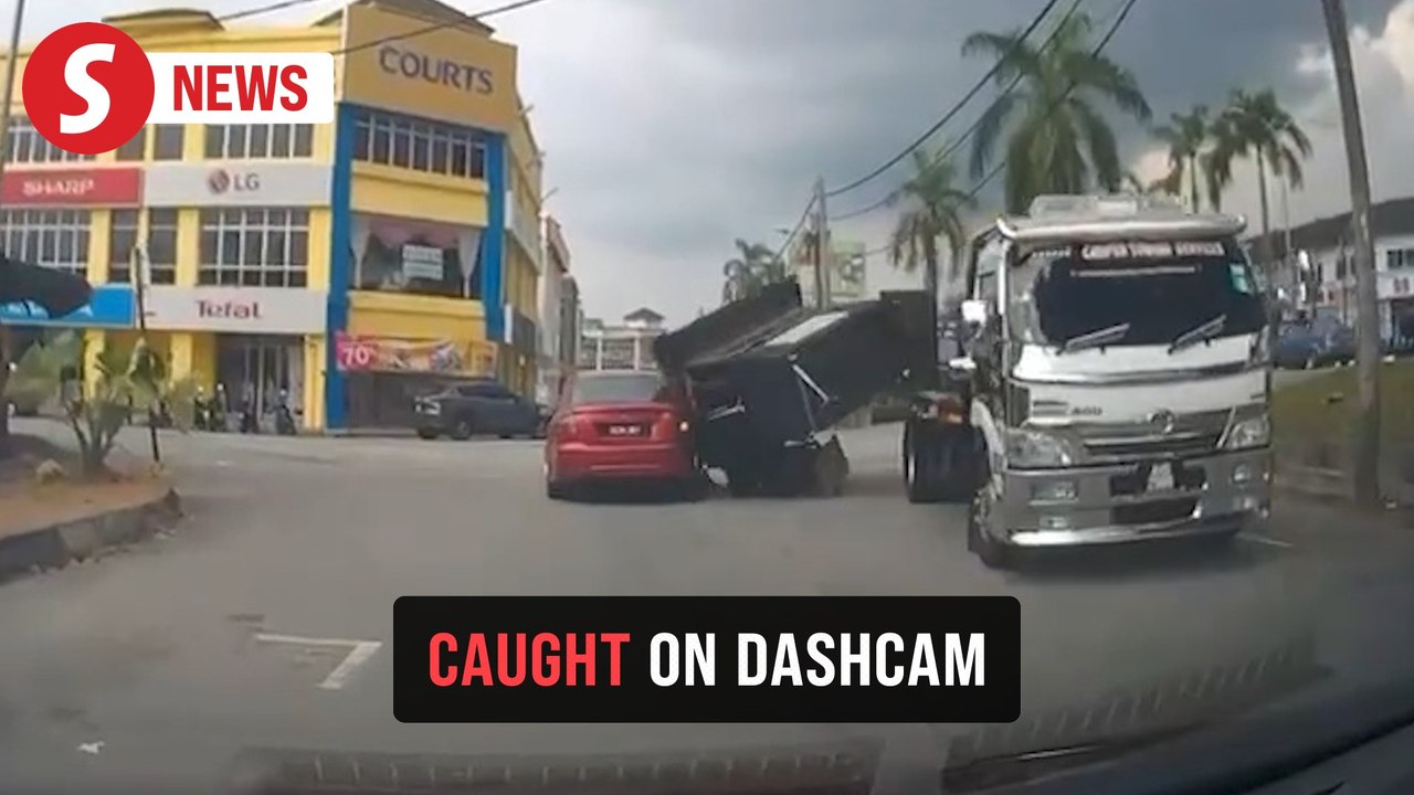 Burger stall topples onto motorcyclist
