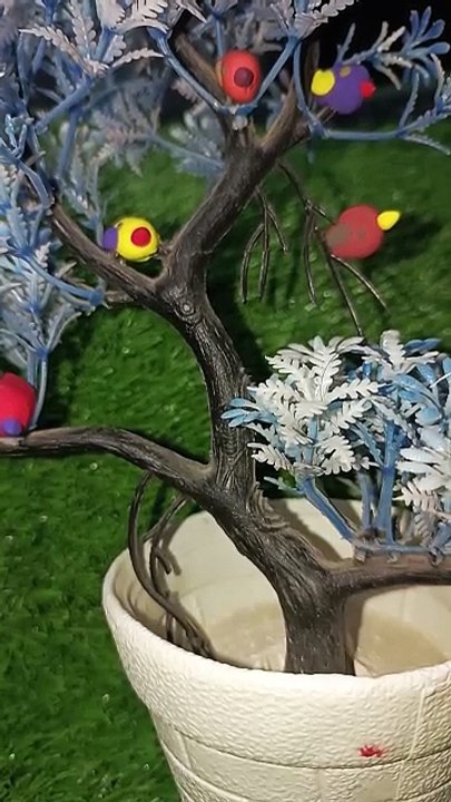 Clay tree with birds