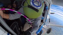 'Circus is in the Air!' - Friends attempt a high-risk four-way skydiving trick involving a hula-hoop ring