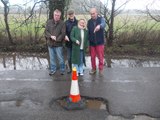 Wield villagers tell how potholes damaged eight cars heading for a wedding