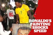IShowSpeed loses his mind when a Ghana fan shows him a Cristiano Ronaldo painting
