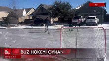 ABD’de donmuş sokakta buz hokeyi oynadılar