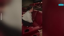 Women's Purse Gets Stuck in Theatre Recliner