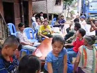 Laos: villageois fêtant Pii-Mai