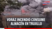 ¡URGENTE! Incendio de grandes proporciones consume almacén de repuestos en Trujillo