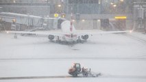 US Airlines Cut More Flights, Brace for Another Storm