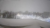 Heavy snow rapidly accumulates at Ohio State University during winter storm in Columbus, Ohio, USA