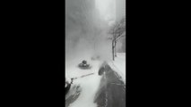 Strong winds whip snow and reduce visibility during winter storm in New York, USA
