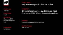 Olympic torch arrives by ski into co-host Cortina as 2026 Winter Games draw closer