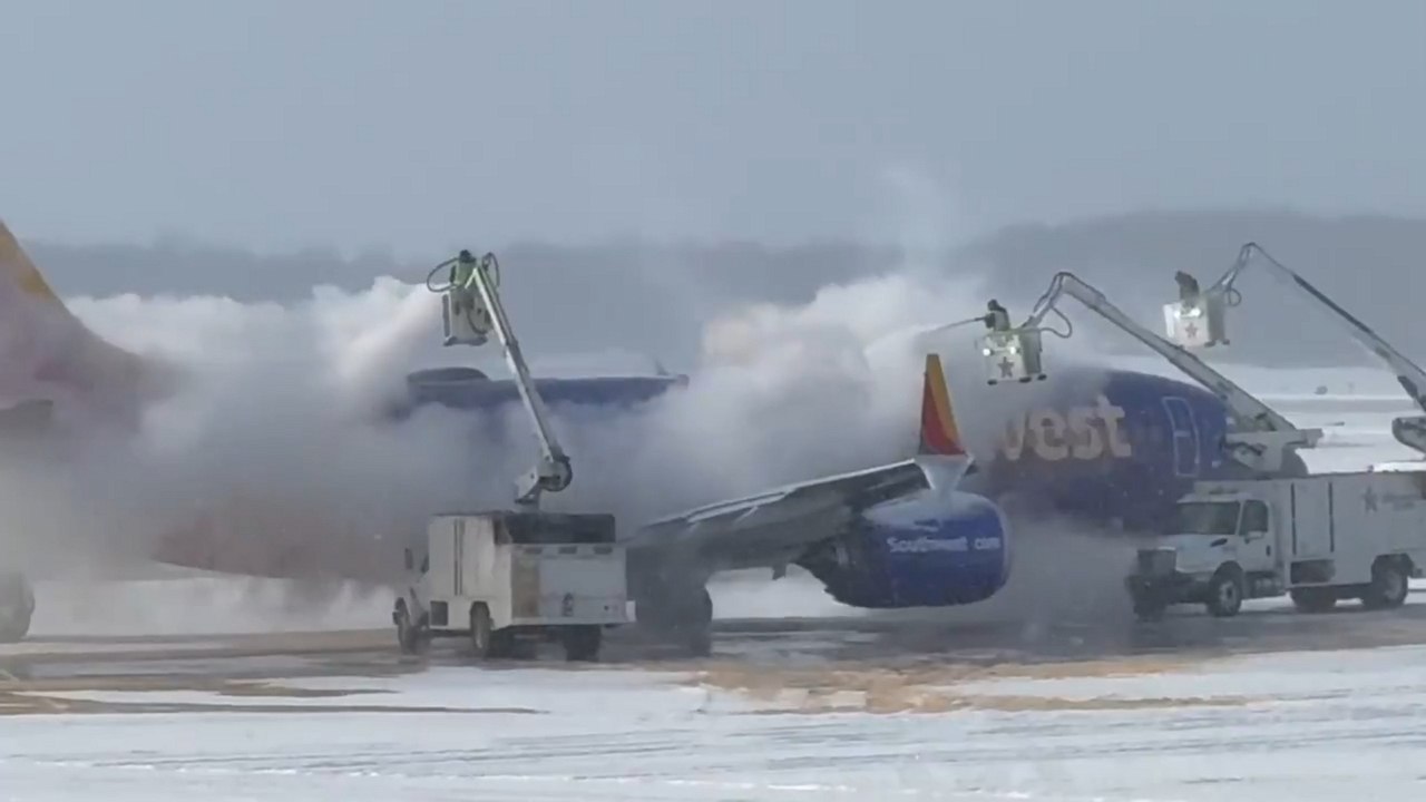 Southwest Airlines jet undergoes deicing amid winter storm in Rochester, New York, USA