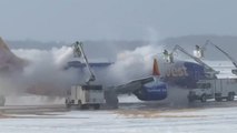 Southwest Airlines jet undergoes deicing amid winter storm in Rochester, New York, USA