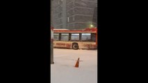 TTC bus struggles through heavy snow during record storm in Toronto, Ontario, Canada
