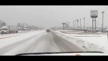 Heavy snow creates hazardous travel on US Route 25-E in Knox, Kentucky, USA